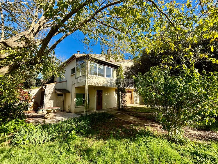 Maison Beauvoisin 7 pièce(s) 135 m2 sur une parcelle de 797m² avec garage et dépendances