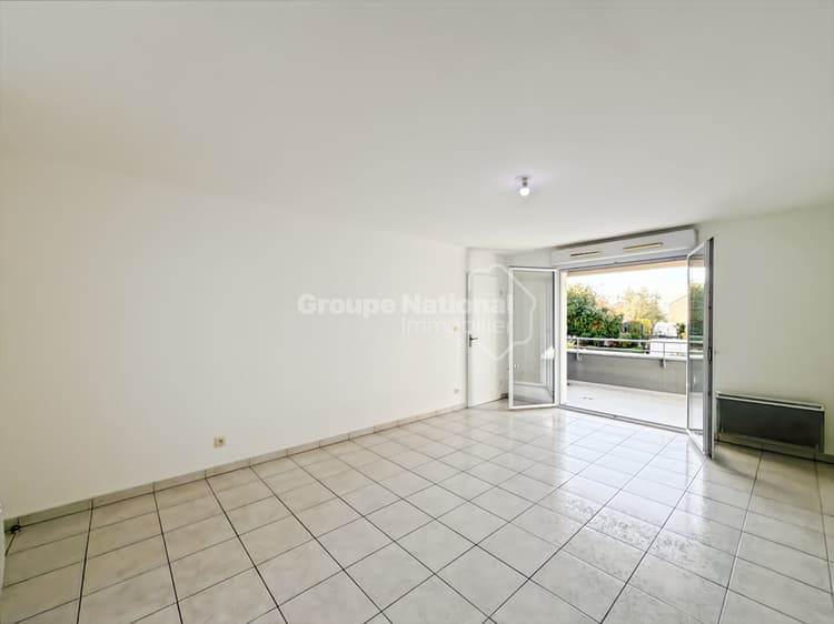 Appartement T3 avec jardin, balcon et double stationnement