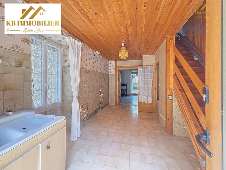 Maison avec garage, véranda, cave et terrain