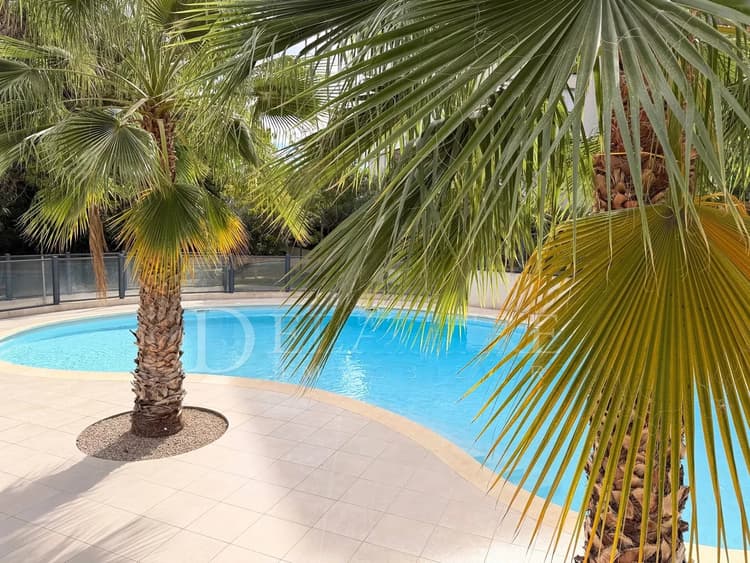 2 pièces rez-de-jardin avec piscine, garage et vue verdure