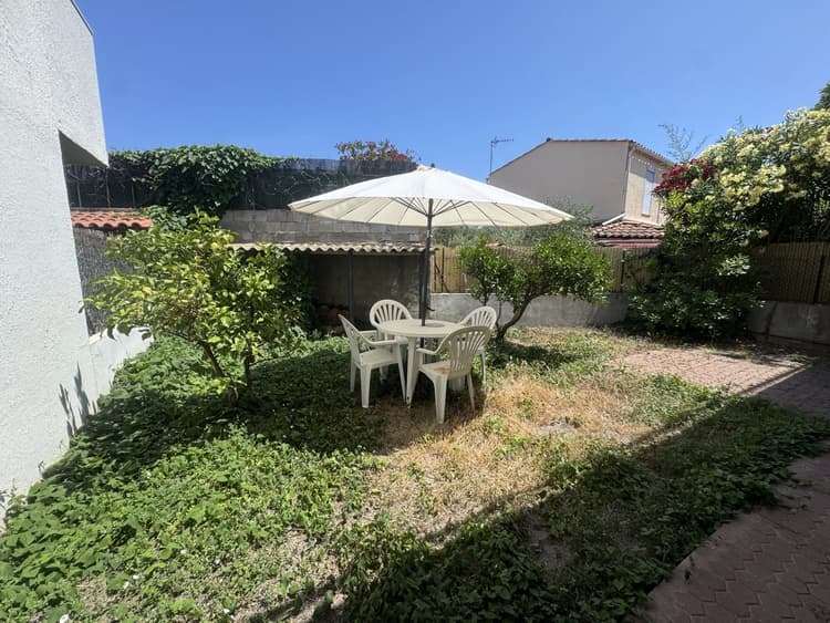 Maison traversante avec jardin