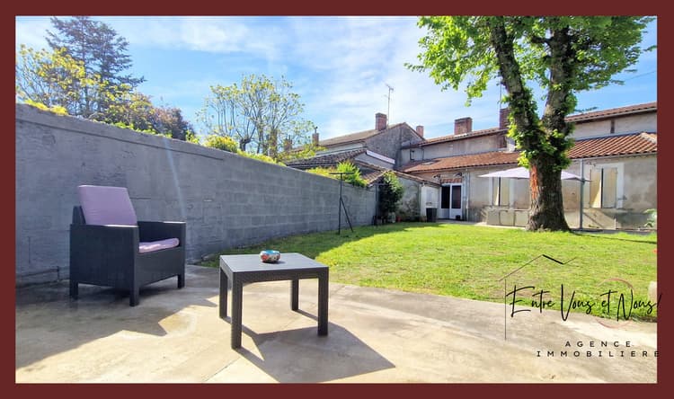 MAISON DE VILLE AVEC JARDIN