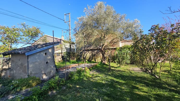 Maison de ville avec joli jardin