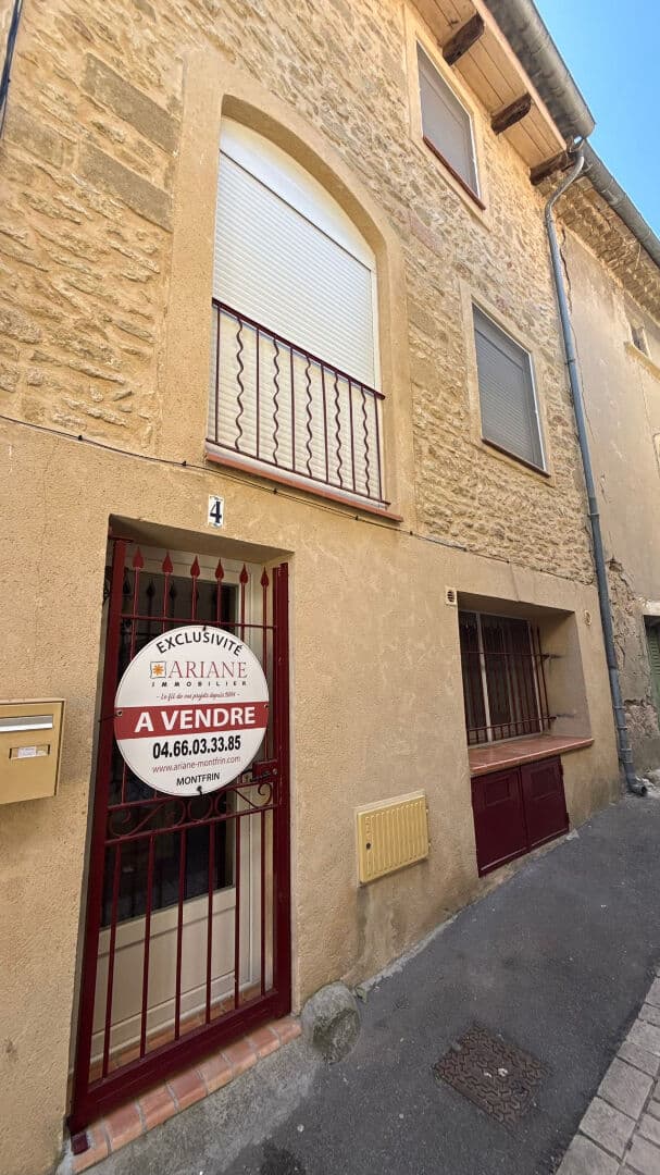 Maison de village en pierre apparente, Sernhac