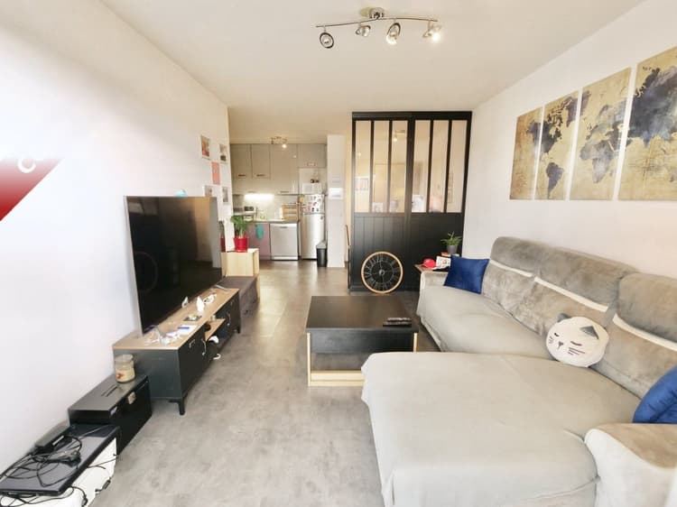 Appartement 3 pièces avec balcon et 2 places de stationneme
